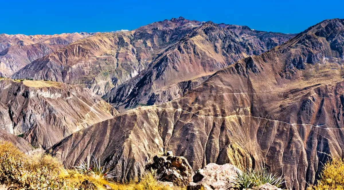 Layered mountain ridges and terraces in the dry canyon landscape
