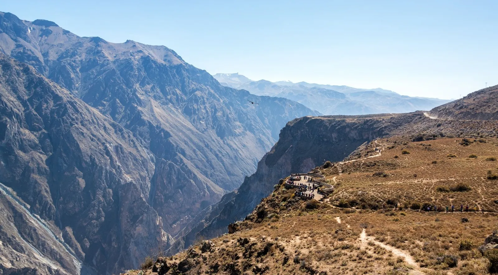 Clear views across steep canyon slopes and a dry plateau