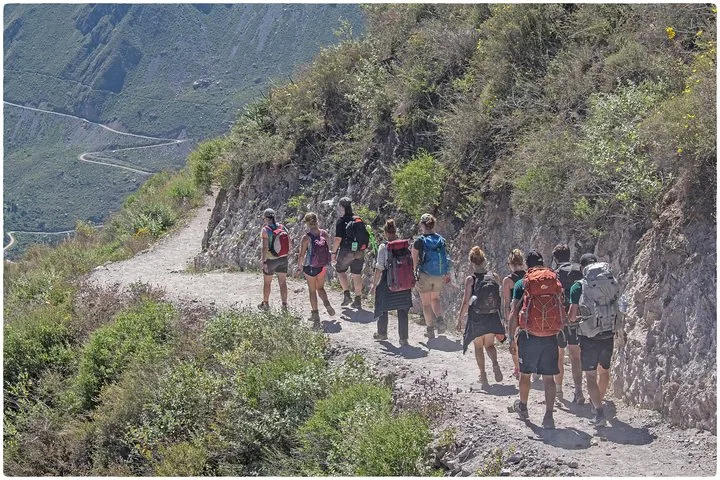 Guided group on a canyon path
